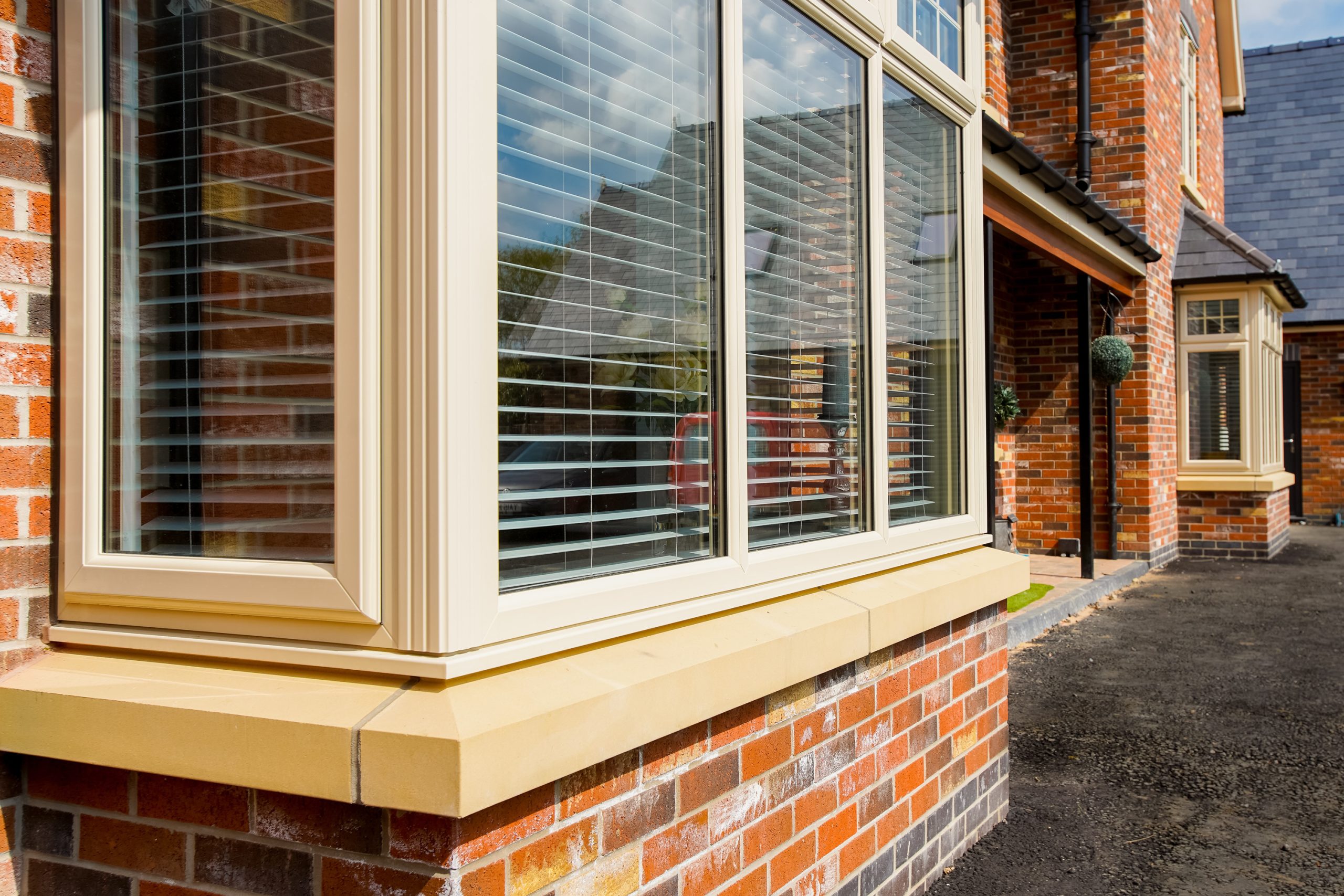 Cream uPVC casement bay windows - Classic Windows Ltd